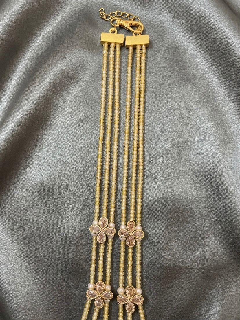 Elegant Three-Strand Pearl and Yellow CZ Crystal Necklace with kundan flowers – Handcrafted Artisan Jewellery best matched with western and traditional attire