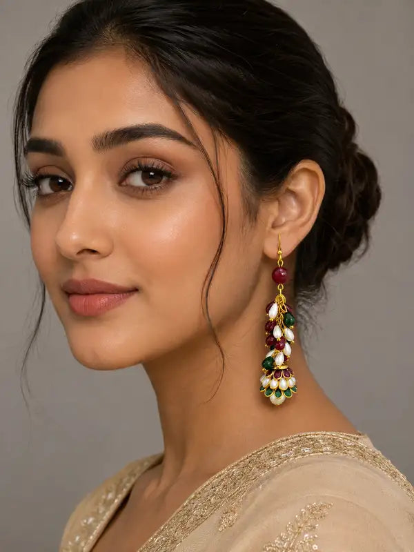 Handcrafted earrings blend of pearls rubies and emeralds,. intricate resin work on jhumki Perfect for adding a sophisticated, traditional flair to any ensemble.