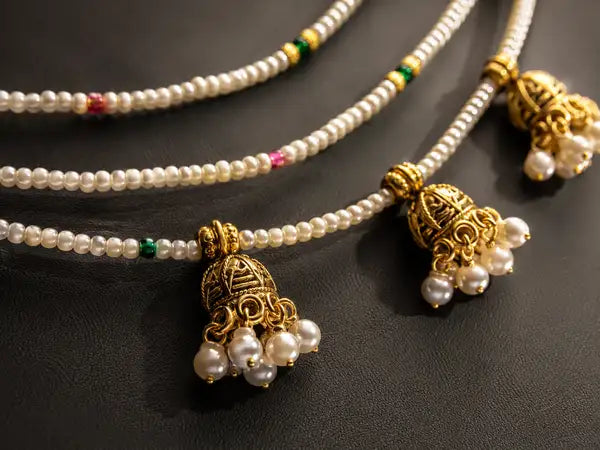 Handmade Pearl and antique jhumki Ear Chain . Ideal ear jewellery for festivals and wedding ceremonies