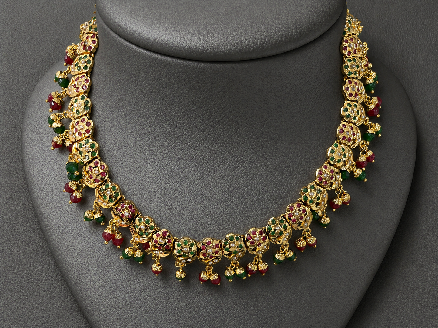 Traditional Jadau Necklace Set with Red & Green Stones and Pearl Embellishments