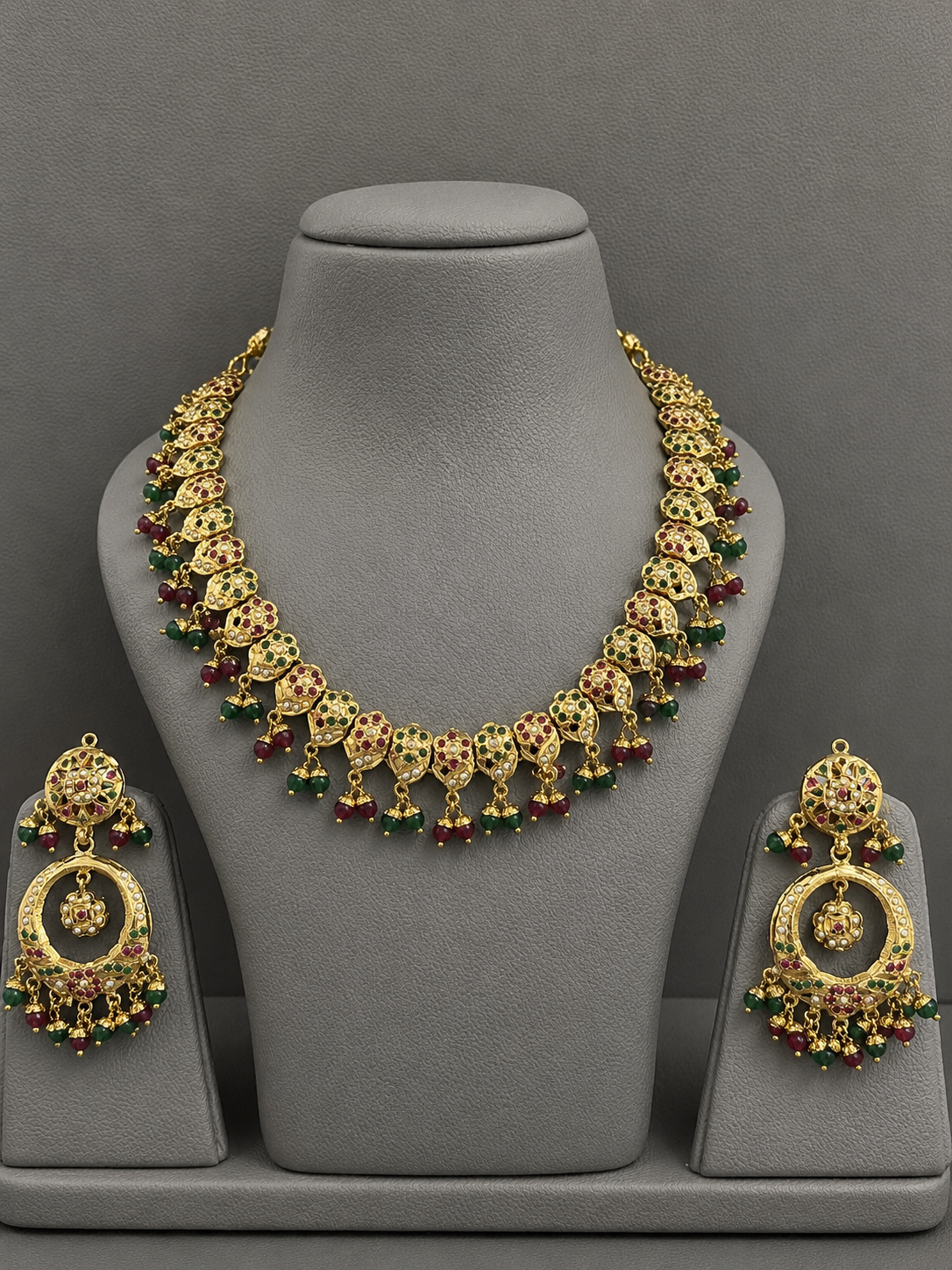 Traditional Jadau Necklace Set with Red & Green Stones and Pearl Embellishments
