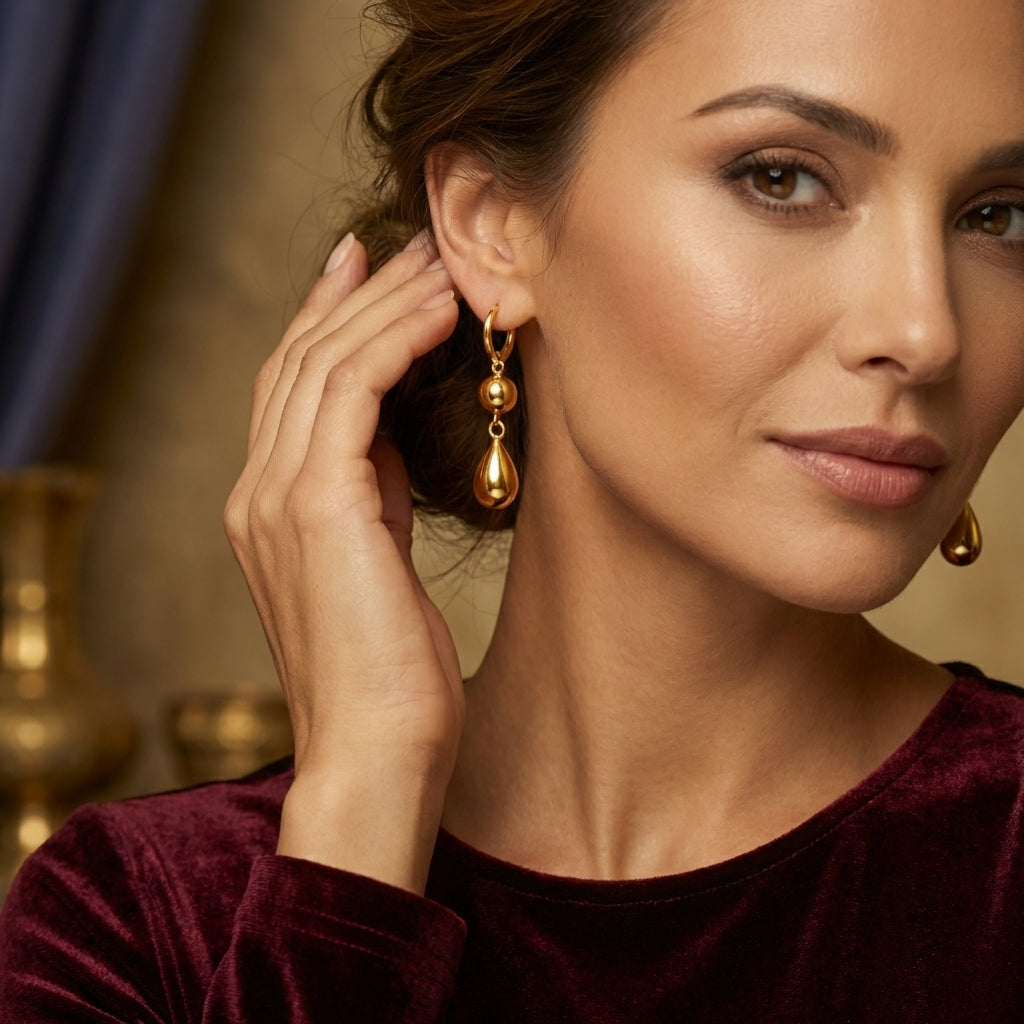 Gold Plated Teardrop And Globe Huggie Earrings