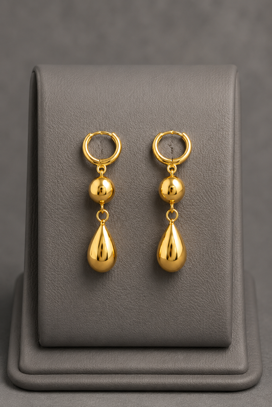 Antique Gold Pearl And Green Emerald Jhumka Earrings