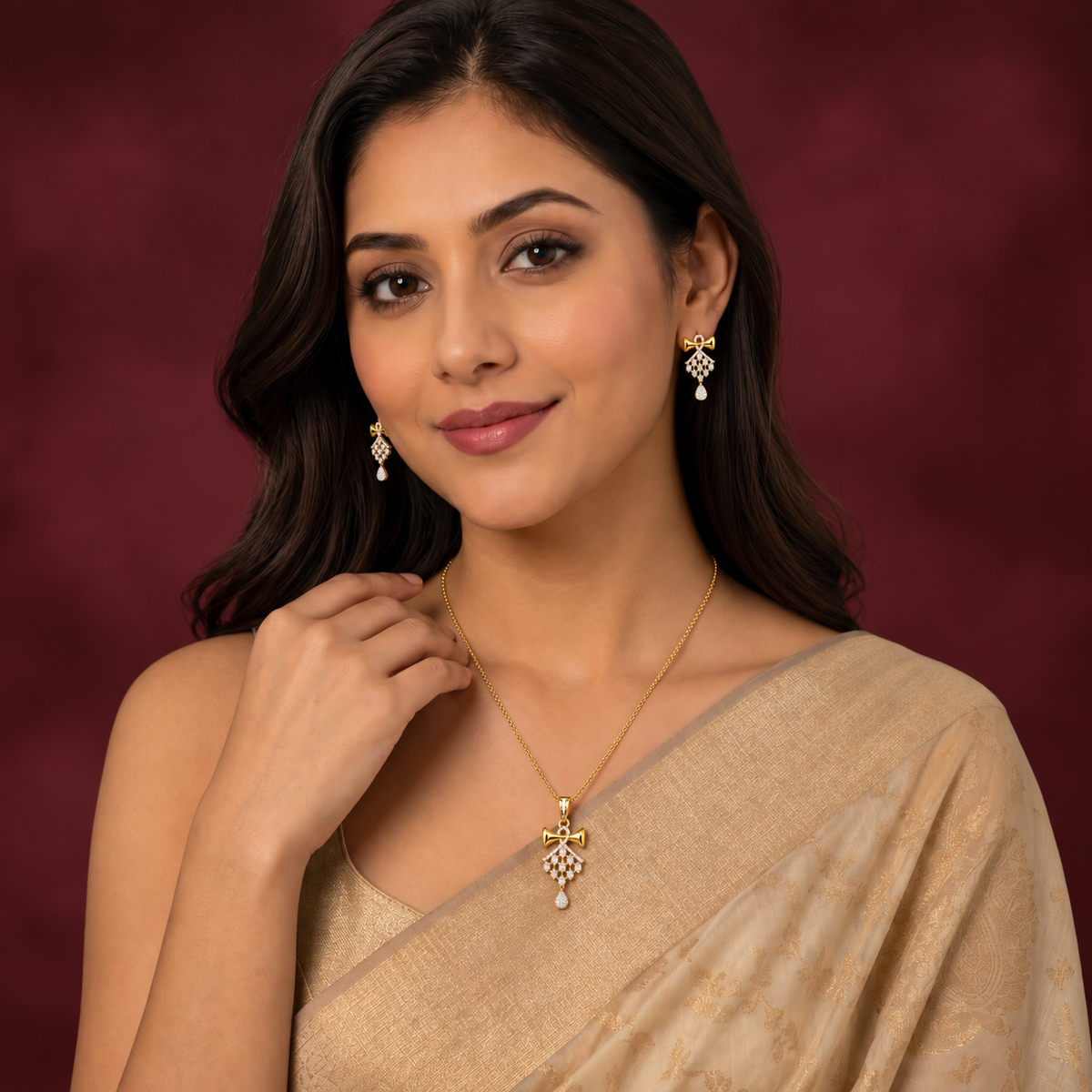 Indian model wearing the antique gold-tone royal crimson gemstone and pearl necklace set with a traditional saree on a rich crimson background