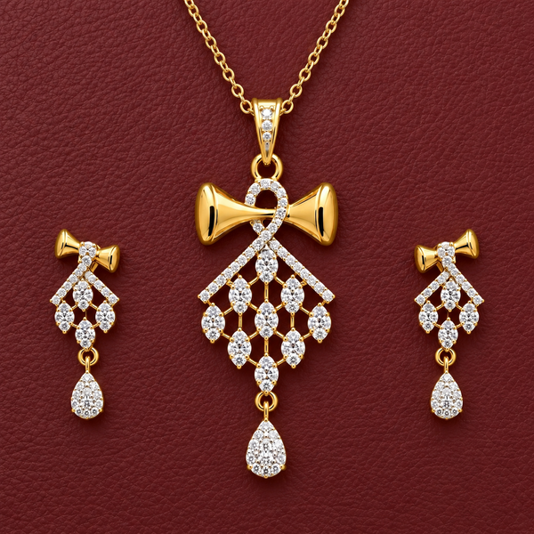 Antique gold-tone necklace and earrings set featuring royal crimson gemstones and pearls on a textured crimson velvet background.