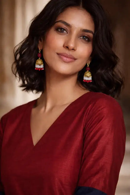 Luxury American Diamond Bell Drop Jhumkis in Gold Finish