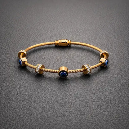 Gold Twisted Wire Evil Eye Bracelet | Crystal Protection Bangle